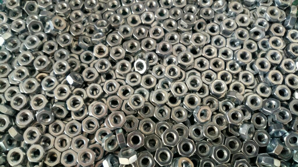 Pile of Silver Hex Nuts
