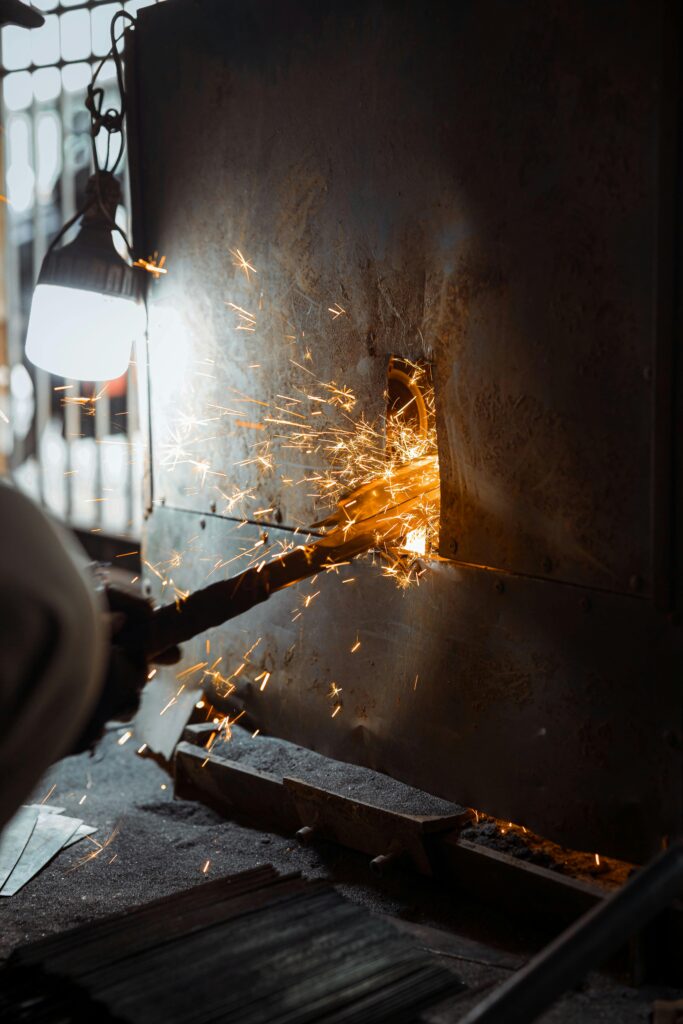 Close-up of Sparks Flying from Metal Grinding Process